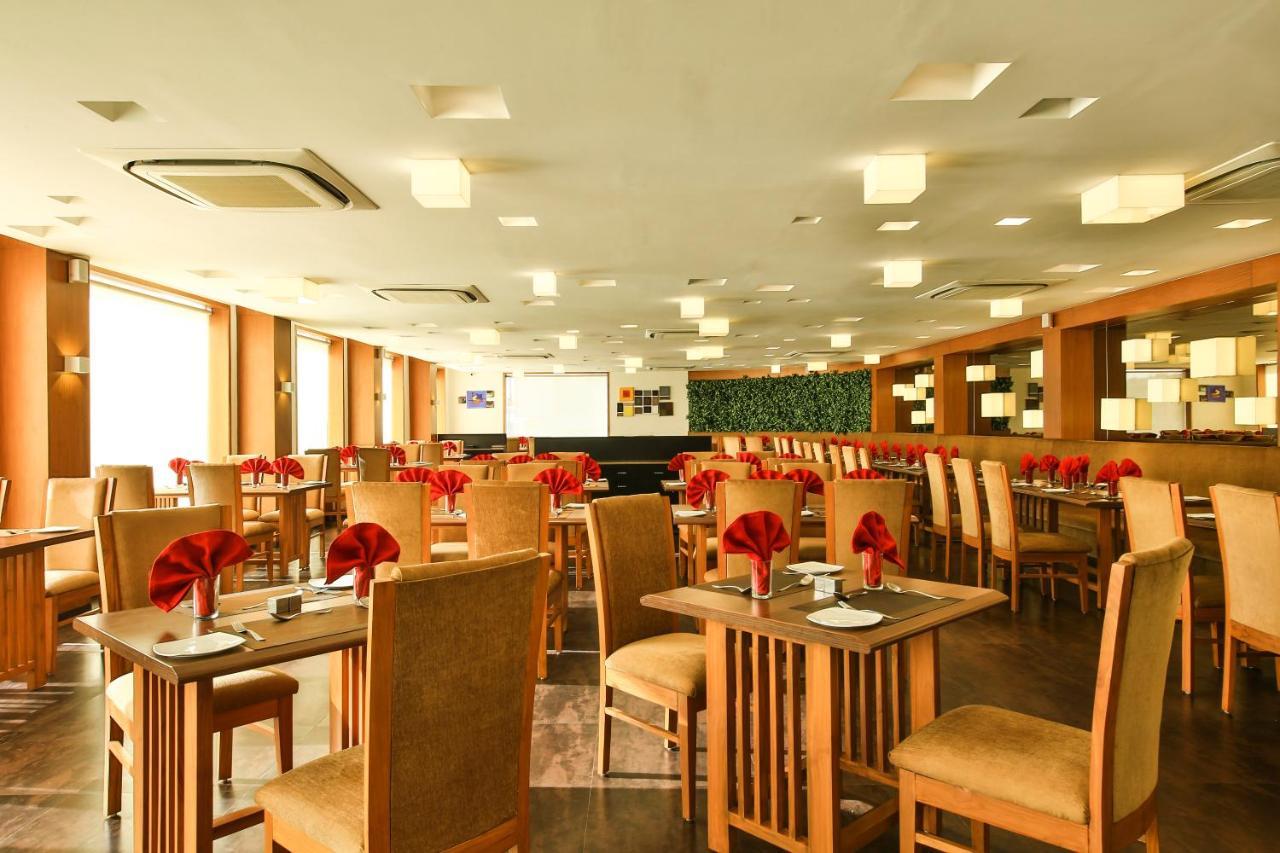 אחמדאבאד Fabhotel Flora Vastral מראה חיצוני תמונה